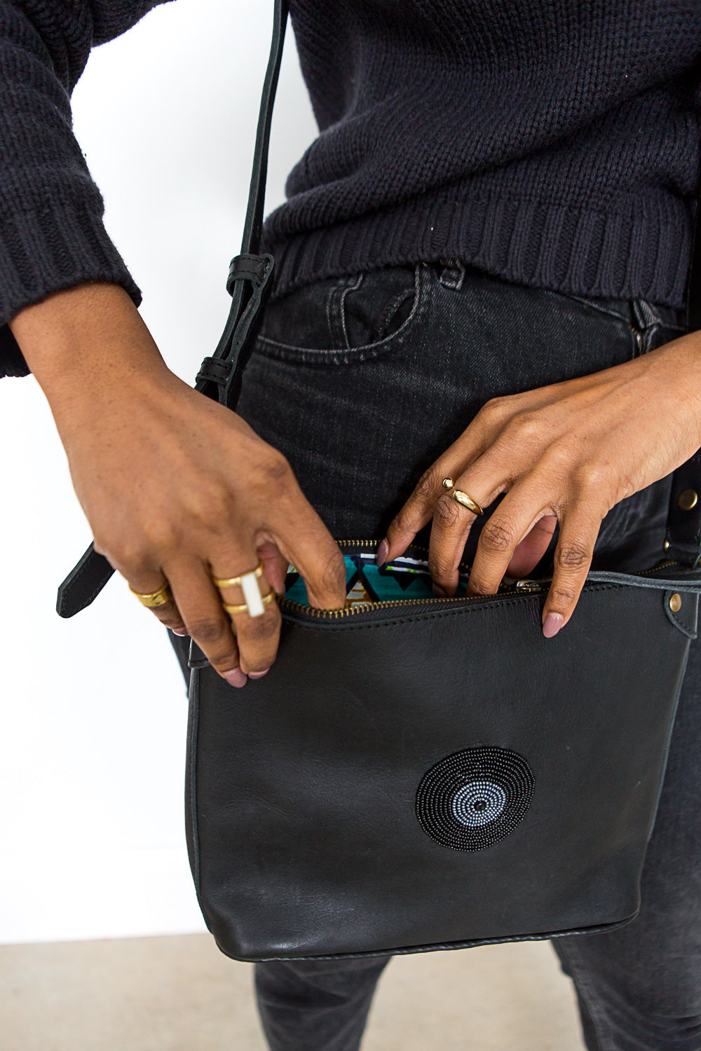 Thick Open Brass Ring on Model with Black Beaded Purse