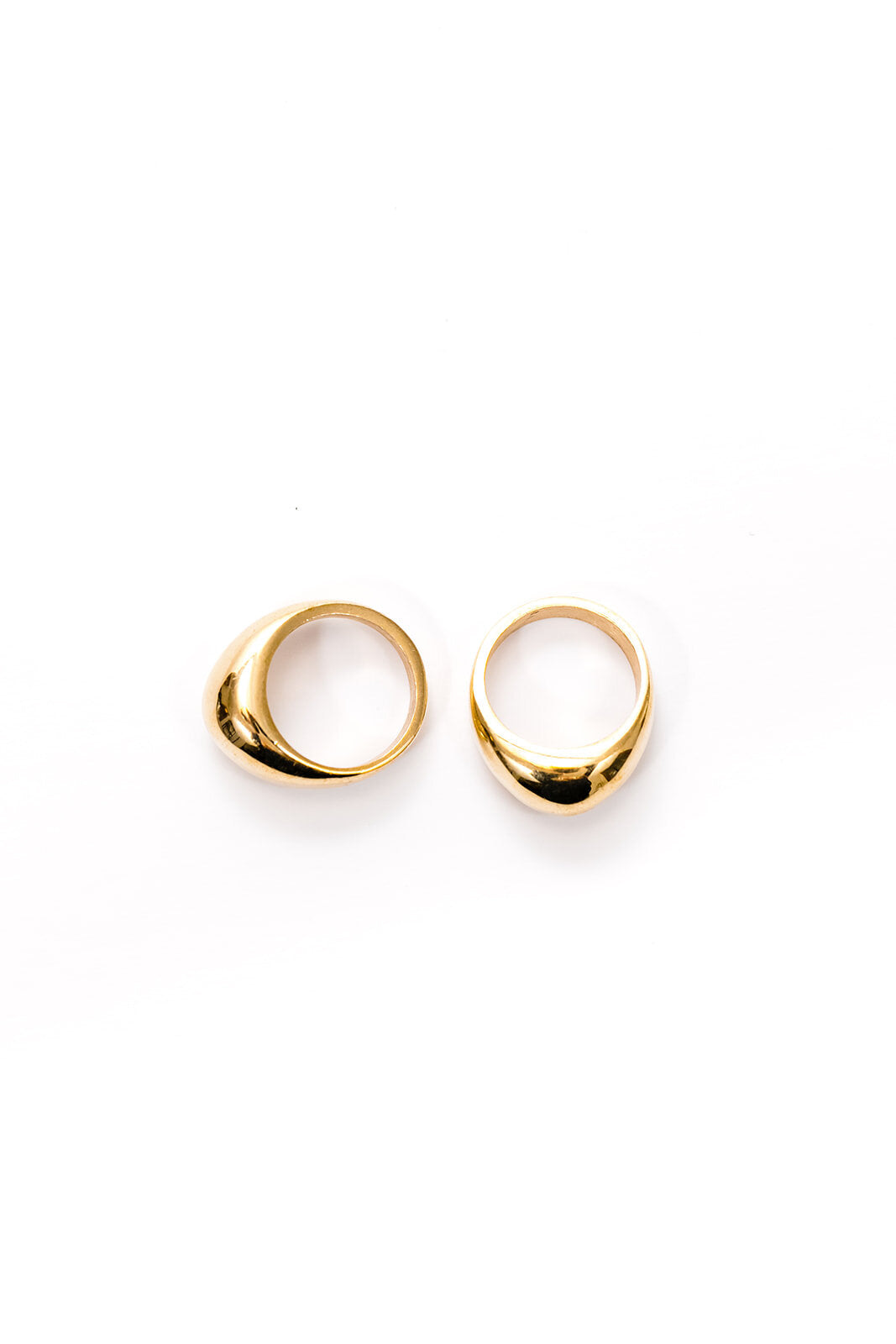 thick brass dome rings side by side