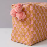 tula tangerine toiletry bag