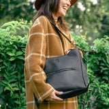 midsized leather crossbody and shoulder bag