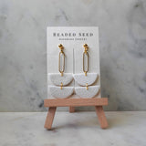 white half circle dangle earrings