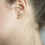 tiny starburst oval studs