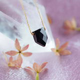 black spinel empowering necklace for she believed