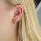 wavy huggie hoop earrings