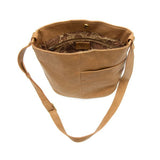 bindi front slip pocket bucket crossbody bag