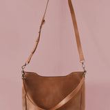midsized leather crossbody and shoulder bag