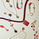 mismatched composition earrings