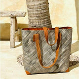 oversized rattan tote bag with brown leather trim