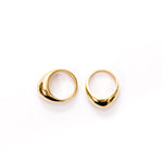 thick brass dome rings side by side
