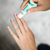 lotion stick on model's hand