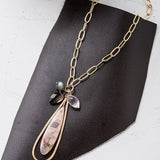 cherry blossom agate necklace on gold paperclip chain
