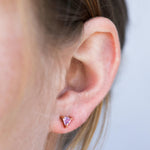purple amethyst triangle stud earrings on model